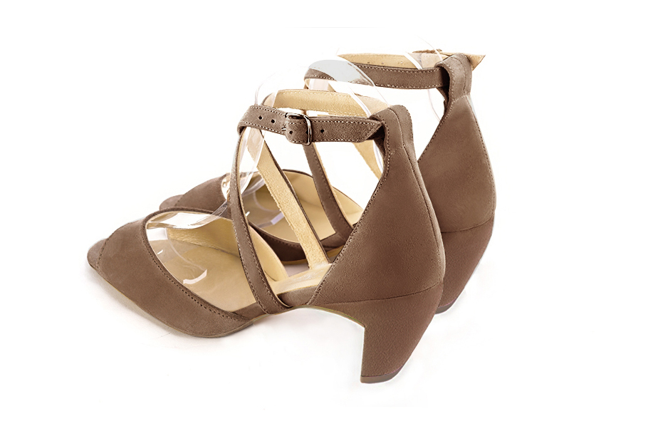 Women's chocolate brown elegant sandals closed at the back with crossed straps. Square toe. Medium comma heels - Rear view